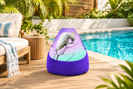 Compact multicolour beanbag cover beside a pool